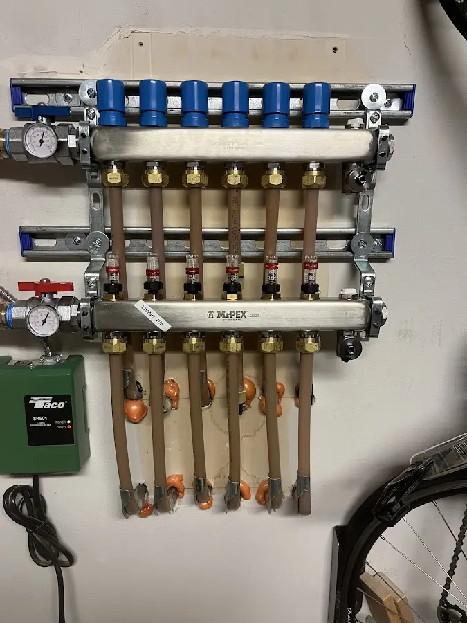 Plumber performing Gas Leak Detection at a residential property in Chantilly